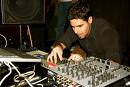 Gui Boratto - on a mixing console in front of the crowd